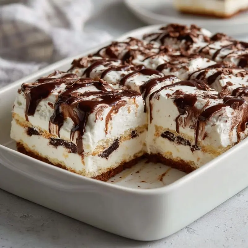 Chocolate Cream Dessert – Easy No-Bake Layered Treat chocolate cream dessert with layered whipped topping cookie base and chocolate drizzle