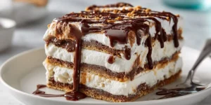 Easy Ice Cream Sandwich Cake with Layers of Chocolate and Cream