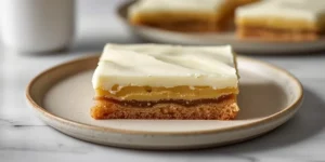 Chewy Sugar Cookie Bars with Soft Frosted Layers