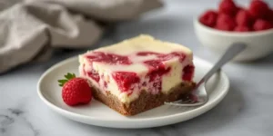 Rich White Chocolate Raspberry Cheesecake Brownies with Creamy Layers